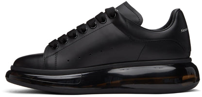 Alexander McQueen oversized shoes with glossy black soles