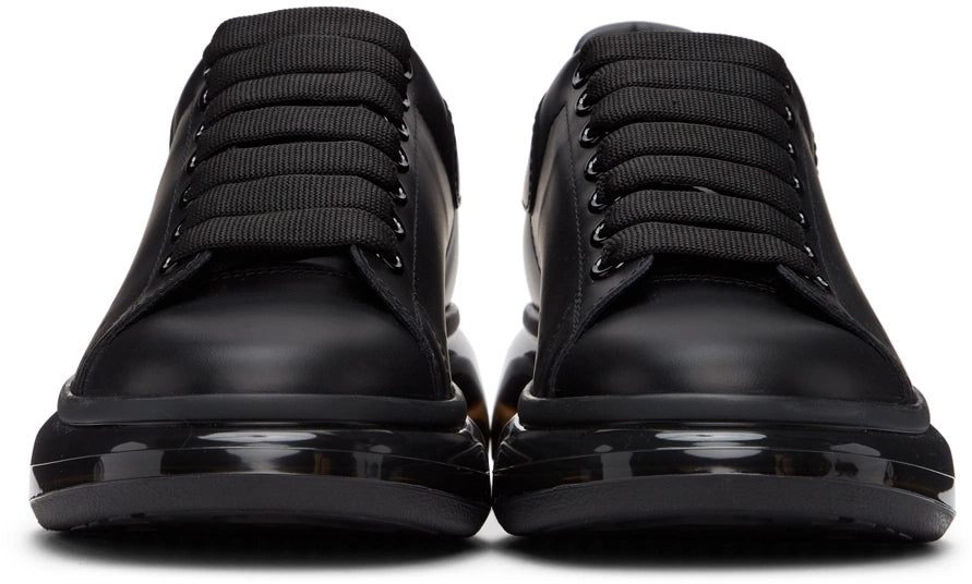 Alexander McQueen oversized shoes with glossy black soles