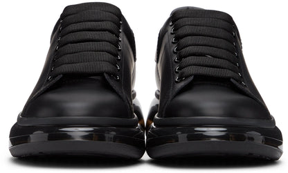 Alexander McQueen oversized shoes with glossy black soles